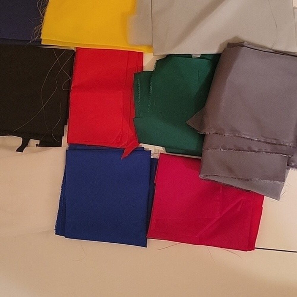 Lot of various colors heavyweight  flag material. 10 colors. Various sizes.